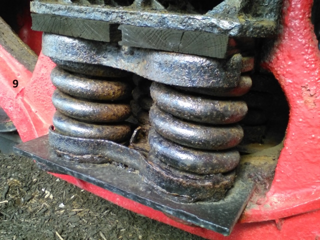 picture 9 two black coils of metal