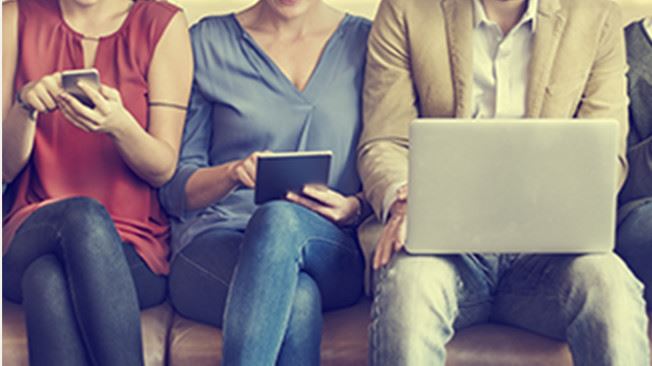 people using laptop tablet and phone