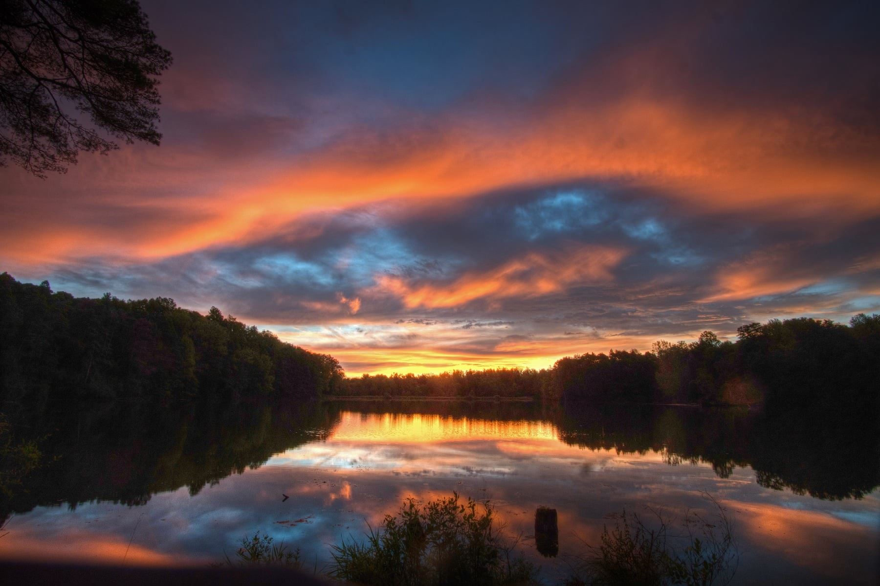 Boughton Park Sunset over pond orange and blue