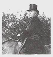 Frank Spring in top hat sitting on a horse